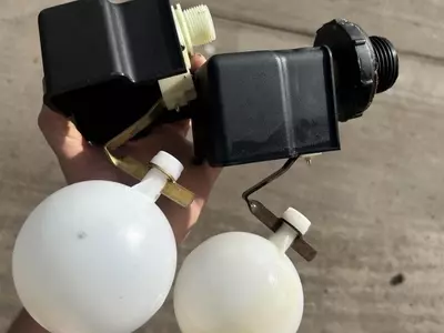 Comparison of old and new float valves used for water tank level control on a pressure washer system. The upgraded float valve provides more reliable water regulation, helping prevent overflows, dry running, and inconsistent water supply issues.
